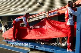 The Ferrari F14-T of Kimi Raikkonen (FIN) Ferrari is recovered back to the pits on the back of a truck. 28.01.2014. Formula One Testing, Day One, Jerez, Spain.