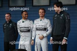 (L to R): Paddy Lowe (GBR) Mercedes AMG F1 Executive Director (Technical); Lewis Hamilton (GBR) Mercedes AMG F1; Nico Rosberg (GER) Mercedes AMG F1; and Toto Wolff (GER) Mercedes AMG F1 Shareholder and Executive Director, at the unveiling of the new Mercedes AMG F1 W05. 28.01.2014. Formula One Testing, Day One, Jerez, Spain.