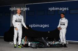 (L to R): Nico Rosberg (GER) Mercedes AMG F1 and team mate Lewis Hamilton (GBR) Mercedes AMG F1 at the unveiling of the new Mercedes AMG F1 W05. 28.01.2014. Formula One Testing, Day One, Jerez, Spain.