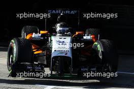 Sergio Perez (MEX) Sahara Force India F1 VJM07 leaves the pits. 28.01.2014. Formula One Testing, Day One, Jerez, Spain.