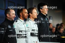 (L to R): Paddy Lowe (GBR) Mercedes AMG F1 Executive Director (Technical); Lewis Hamilton (GBR) Mercedes AMG F1; Nico Rosberg (GER) Mercedes AMG F1; and Toto Wolff (GER) Mercedes AMG F1 Shareholder and Executive Director, at the unveiling of the new Mercedes AMG F1 W05. 28.01.2014. Formula One Testing, Day One, Jerez, Spain.