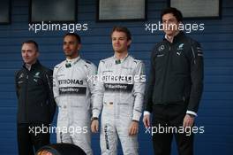 (L to R): Paddy Lowe (GBR) Mercedes AMG F1 Executive Director (Technical); Lewis Hamilton (GBR) Mercedes AMG F1; Nico Rosberg (GER) Mercedes AMG F1; and Toto Wolff (GER) Mercedes AMG F1 Shareholder and Executive Director, at the unveiling of the new Mercedes AMG F1 W05. 28.01.2014. Formula One Testing, Day One, Jerez, Spain.