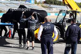 FIA Delegates inspect the first corner after Lewis Hamilton (GBR) Mercedes AMG F1 crashed. 28.01.2014. Formula One Testing, Day One, Jerez, Spain.