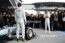 (L to R): Nico Rosberg (GER) Mercedes AMG F1 and team mate Lewis Hamilton (GBR) Mercedes AMG F1 at the unveiling of the new Mercedes AMG F1 W05. 28.01.2014. Formula One Testing, Day One, Jerez, Spain.