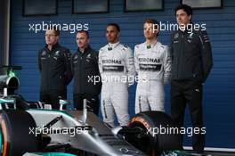 (L to R): Paddy Lowe (GBR) Mercedes AMG F1 Executive Director (Technical); Lewis Hamilton (GBR) Mercedes AMG F1; Nico Rosberg (GER) Mercedes AMG F1; and Toto Wolff (GER) Mercedes AMG F1 Shareholder and Executive Director, at the unveiling of the new Mercedes AMG F1 W05. 28.01.2014. Formula One Testing, Day One, Jerez, Spain.