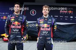 (L to R): Daniel Ricciardo (AUS) Red Bull Racing and team mate Sebastian Vettel (GER) Red Bull Racing at the unveiling of the Red Bull Racing RB10. 28.01.2014. Formula One Testing, Day One, Jerez, Spain.