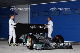 (L to R): Nico Rosberg (GER) Mercedes AMG F1 and team mate Lewis Hamilton (GBR) Mercedes AMG F1 at the unveiling of the new Mercedes AMG F1 W05. 28.01.2014. Formula One Testing, Day One, Jerez, Spain.