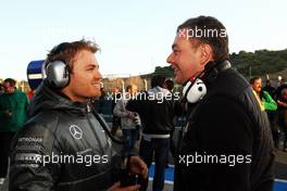 (L to R): Nico Rosberg (GER) Mercedes AMG F1 with Mario Isola (ITA) Pirelli Racing Manager. 28.01.2014. Formula One Testing, Day One, Jerez, Spain.