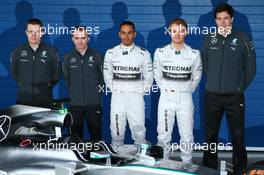 (L to R): Paddy Lowe (GBR) Mercedes AMG F1 Executive Director (Technical); Lewis Hamilton (GBR) Mercedes AMG F1; Nico Rosberg (GER) Mercedes AMG F1; and Toto Wolff (GER) Mercedes AMG F1 Shareholder and Executive Director, at the unveiling of the new Mercedes AMG F1 W05. 28.01.2014. Formula One Testing, Day One, Jerez, Spain.