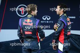 (L to R): Sebastian Vettel (GER) Red Bull Racing with team mate Daniel Ricciardo (AUS) Red Bull Racing at the unveiling of the Red Bull Racing RB10. 28.01.2014. Formula One Testing, Day One, Jerez, Spain.