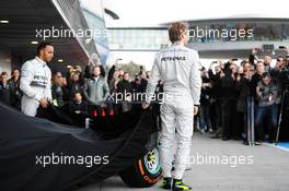 (L to R): Lewis Hamilton (GBR) Mercedes AMG F1 and team mate Nico Rosberg (GER) Mercedes AMG F1 at the unveiling of the new Mercedes AMG F1 W05. 28.01.2014. Formula One Testing, Day One, Jerez, Spain.