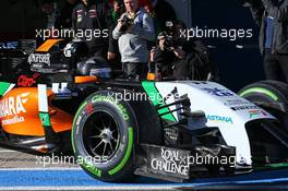 Sergio Perez (MEX) Sahara Force India F1 VJM07 leaves the pits. 28.01.2014. Formula One Testing, Day One, Jerez, Spain.