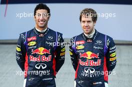 (L to R): Daniel Ricciardo (AUS) Red Bull Racing and team mate Sebastian Vettel (GER) Red Bull Racing at the unveiling of the new Red Bull Racing RB10. 28.01.2014. Formula One Testing, Day One, Jerez, Spain.