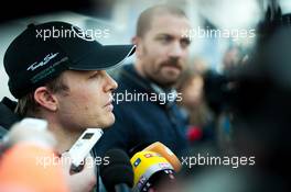 Nico Rosberg (GER) Mercedes AMG F1 with the media. 29.01.2014. Formula One Testing, Day Two, Jerez, Spain.