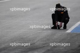 Pirelli tyre technician takes a track temperature reading. 29.01.2014. Formula One Testing, Day Two, Jerez, Spain.