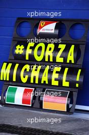 A Ferrari pit board showing support for Michael Schumacher (GER). 29.01.2014. Formula One Testing, Day Two, Jerez, Spain.