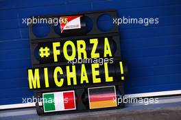 A Ferrari pit board with a message of support for Michael Schumacher (GER). 29.01.2014. Formula One Testing, Day Two, Jerez, Spain.