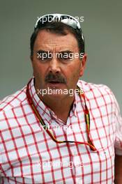 Nigel Mansell (GBR), with his moustache back. 03.10.2014. Formula 1 World Championship, Rd 15, Japanese Grand Prix, Suzuka, Japan, Practice Day.