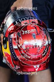 The helmet of Sebastian Vettel (GER) Red Bull Racing. 03.10.2014. Formula 1 World Championship, Rd 15, Japanese Grand Prix, Suzuka, Japan, Practice Day.