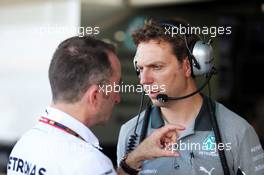 (L to R): Paddy Lowe (GBR) Mercedes AMG F1 Executive Director (Technical) with Matt Deane (GBR) Mercedes AMG F1 Race Engineer. 03.10.2014. Formula 1 World Championship, Rd 15, Japanese Grand Prix, Suzuka, Japan, Practice Day.