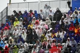 Fans in the grandstand. 05.10.2014. Formula 1 World Championship, Rd 15, Japanese Grand Prix, Suzuka, Japan, Race Day.