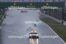 Nico Rosberg (GER) Mercedes AMG F1 W05 leads the race behind the FIA Safety Car. 05.10.2014. Formula 1 World Championship, Rd 15, Japanese Grand Prix, Suzuka, Japan, Race Day.
