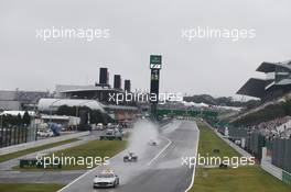 The FIA Safety Car restarts the race out of the pits with Nico Rosberg (GER) Mercedes AMG F1 W05 leading. 05.10.2014. Formula 1 World Championship, Rd 15, Japanese Grand Prix, Suzuka, Japan, Race Day.