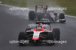 Jules Bianchi (FRA) Marussia F1 Team MR03 leads Adrian Sutil (GER) Sauber C33. 05.10.2014. Formula 1 World Championship, Rd 15, Japanese Grand Prix, Suzuka, Japan, Race Day.