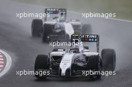 Valtteri Bottas (FIN) Williams FW36 leads team mate Felipe Massa (BRA) Williams FW36. 05.10.2014. Formula 1 World Championship, Rd 15, Japanese Grand Prix, Suzuka, Japan, Race Day.