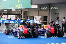 Daniel Ricciardo (AUS) Red Bull Racing RB10 and Sebastian Vettel (GER) Red Bull Racing. 04.10.2014. Formula 1 World Championship, Rd 15, Japanese Grand Prix, Suzuka, Japan, Qualifying Day.