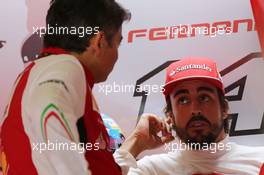 (L to R): Marco Mattiacci (ITA) Ferrari Team Principal with Fernando Alonso (ESP) Ferrari. 04.10.2014. Formula 1 World Championship, Rd 15, Japanese Grand Prix, Suzuka, Japan, Qualifying Day.