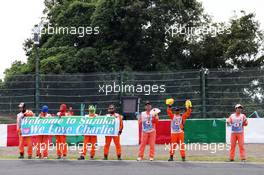 Marshals and fans of Charlie Whiting (GBR) FIA Delegate. 04.10.2014. Formula 1 World Championship, Rd 15, Japanese Grand Prix, Suzuka, Japan, Qualifying Day.