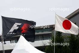 F1 and Japanese flags. 04.10.2014. Formula 1 World Championship, Rd 15, Japanese Grand Prix, Suzuka, Japan, Qualifying Day.