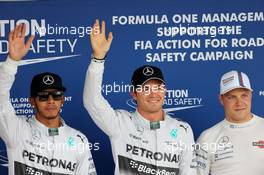 Lewis Hamilton (GBR), Mercedes AMG F1 Team, Nico Rosberg (GER), Mercedes AMG F1 Team and Valtteri Bottas (FIN), Williams F1 Team  04.10.2014. Formula 1 World Championship, Rd 15, Japanese Grand Prix, Suzuka, Japan, Qualifying Day.