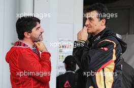 (L to R): Luis Garcia Abad (ESP) Driver Manager of Fernando Alonso (ESP) Ferrari with Federico Gastaldi (ARG) Lotus F1 Team Deputy Team Principal. 05.10.2014. Formula 1 World Championship, Rd 15, Japanese Grand Prix, Suzuka, Japan, Race Day.