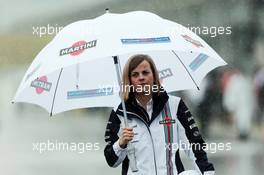 Susie Wolff (GBR) Williams Development Driver in a wet and rainy paddock. 05.10.2014. Formula 1 World Championship, Rd 15, Japanese Grand Prix, Suzuka, Japan, Race Day.