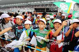 Young Sahara Force India F1 Team fans in the pits. 02.10.2014. Formula 1 World Championship, Rd 15, Japanese Grand Prix, Suzuka, Japan, Preparation Day.
