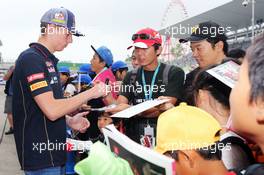 Max Verstappen (NLD) Scuderia Toro Rosso Test Driver signs autographs for the fans. 02.10.2014. Formula 1 World Championship, Rd 15, Japanese Grand Prix, Suzuka, Japan, Preparation Day.