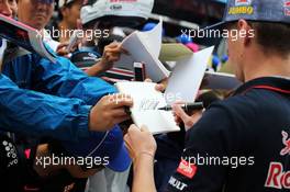 Max Verstappen (NLD) Scuderia Toro Rosso Test Driver signs autographs for the fans. 02.10.2014. Formula 1 World Championship, Rd 15, Japanese Grand Prix, Suzuka, Japan, Preparation Day.