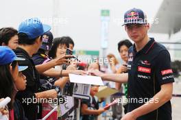 Max Verstappen (NLD) Scuderia Toro Rosso Test Driver signs autographs for the fans. 02.10.2014. Formula 1 World Championship, Rd 15, Japanese Grand Prix, Suzuka, Japan, Preparation Day.