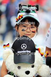 A young Nico Rosberg (GER) Mercedes AMG F1 fan. 02.10.2014. Formula 1 World Championship, Rd 15, Japanese Grand Prix, Suzuka, Japan, Preparation Day.