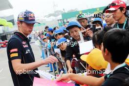 Max Verstappen (NLD) Scuderia Toro Rosso Test Driver signs autographs for the fans. 02.10.2014. Formula 1 World Championship, Rd 15, Japanese Grand Prix, Suzuka, Japan, Preparation Day.