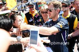 Sebastian Vettel (GER) Red Bull Racing signs autographs for the fans. 23.05.2014. Formula 1 World Championship, Rd 6, Monaco Grand Prix, Monte Carlo, Monaco, Friday.