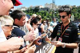 Sergio Perez (MEX) Sahara Force India F1 signs autographs for the fans. 23.05.2014. Formula 1 World Championship, Rd 6, Monaco Grand Prix, Monte Carlo, Monaco, Friday.
