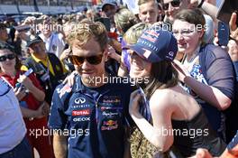 Sebastian Vettel (GER) Red Bull Racing with fans. 23.05.2014. Formula 1 World Championship, Rd 6, Monaco Grand Prix, Monte Carlo, Monaco, Friday.