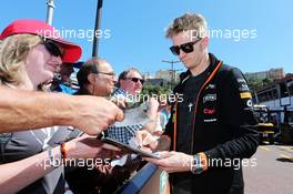 Nico Hulkenberg (GER) Sahara Force India F1 signs autographs for the fans. 23.05.2014. Formula 1 World Championship, Rd 6, Monaco Grand Prix, Monte Carlo, Monaco, Friday.