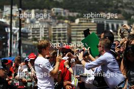 Nico Rosberg (GER) Mercedes AMG F1 signs autographs for the fans. 23.05.2014. Formula 1 World Championship, Rd 6, Monaco Grand Prix, Monte Carlo, Monaco, Friday.