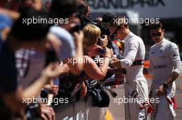 Max Chilton (GBR) Marussia F1 Team and Jules Bianchi (FRA) Marussia F1 Team sign autographs for the fans. 23.05.2014. Formula 1 World Championship, Rd 6, Monaco Grand Prix, Monte Carlo, Monaco, Friday.