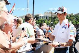 Esteban Gutierrez (MEX) Sauber signs autographs for the fans. 23.05.2014. Formula 1 World Championship, Rd 6, Monaco Grand Prix, Monte Carlo, Monaco, Friday.