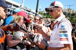 Adrian Sutil (GER) Sauber signs autographs for the fans. 23.05.2014. Formula 1 World Championship, Rd 6, Monaco Grand Prix, Monte Carlo, Monaco, Friday.